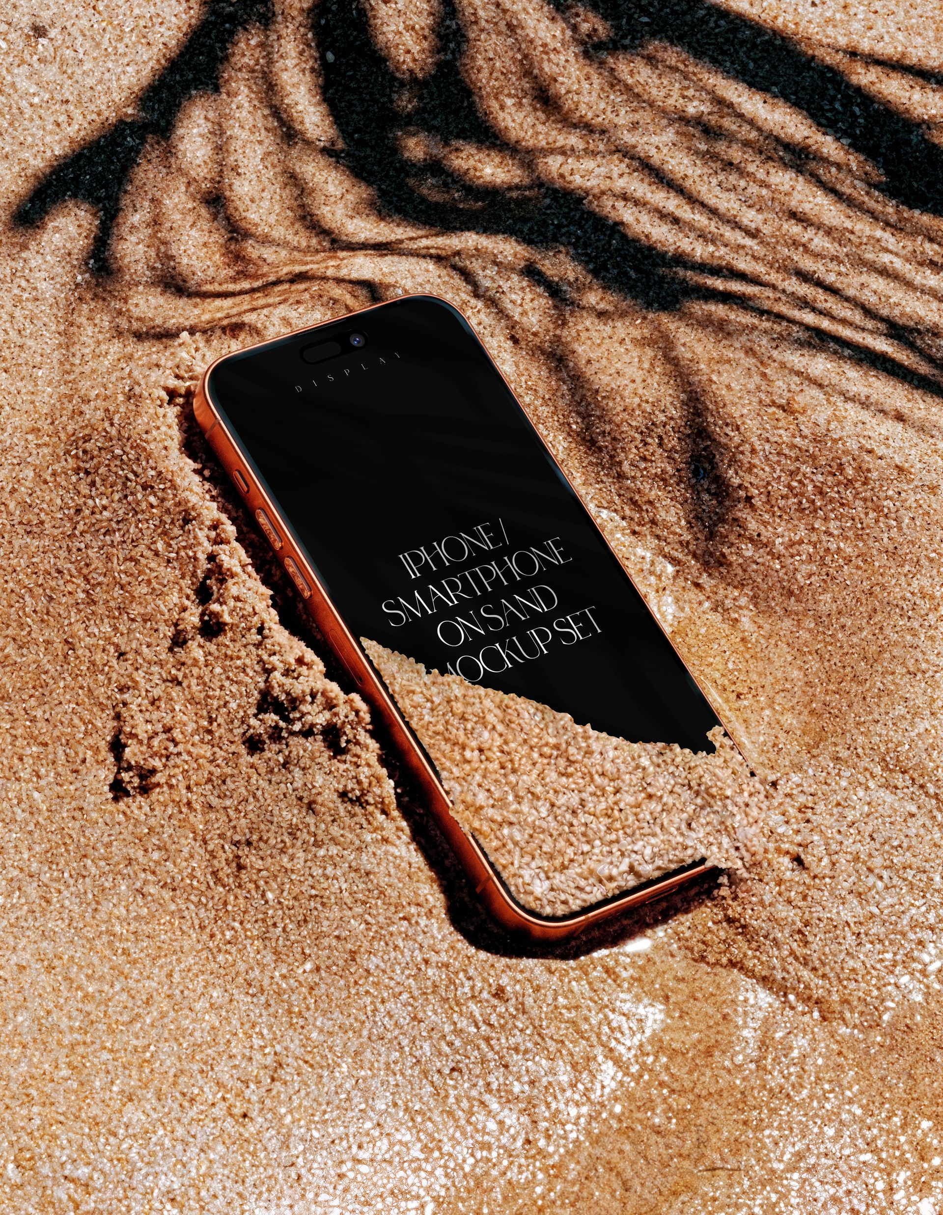 iPhone smartphone partially buried in sand, front view with screen visible, beach setting, PSD mockup.