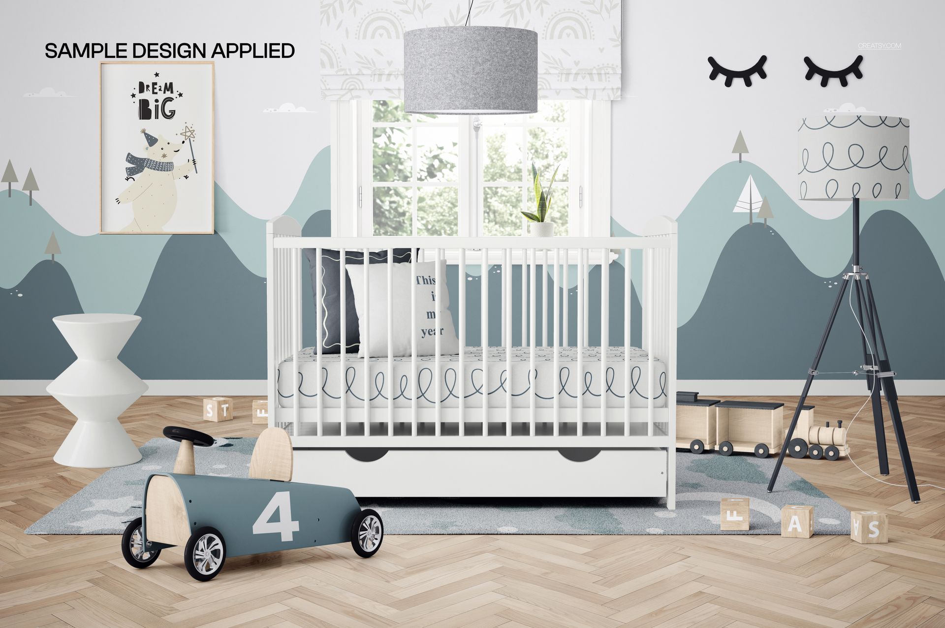 Front view of a baby crib with storage drawer in a nursery mockup, surrounded by toys and pastel decor.