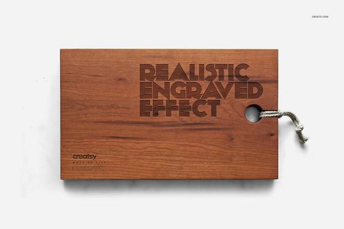 Top view of a wooden board mockup with realistic engraved lettering and a rope handle, placed on a clean white surface.