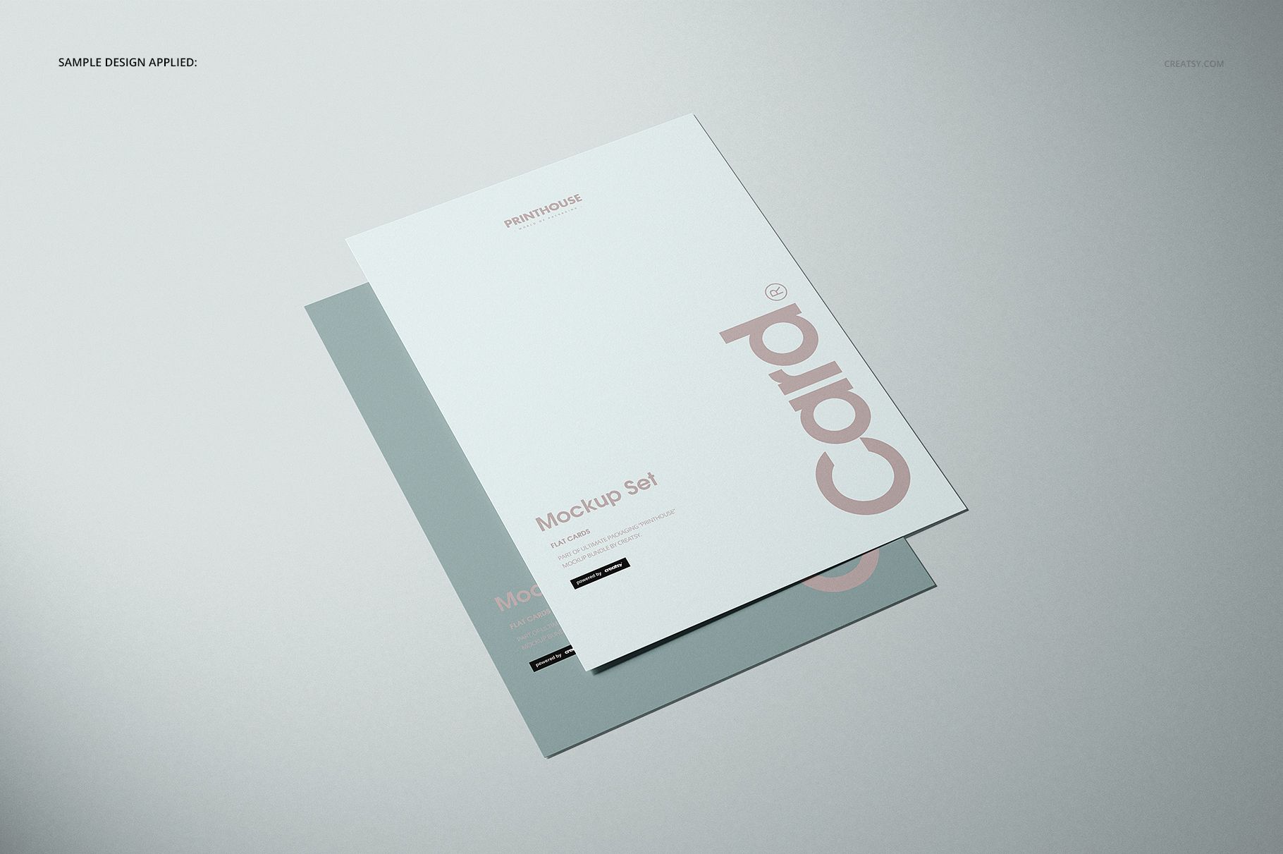 Flat cards mockup set featuring two paper cards with simple text and muted colors, arranged on a gray surface.