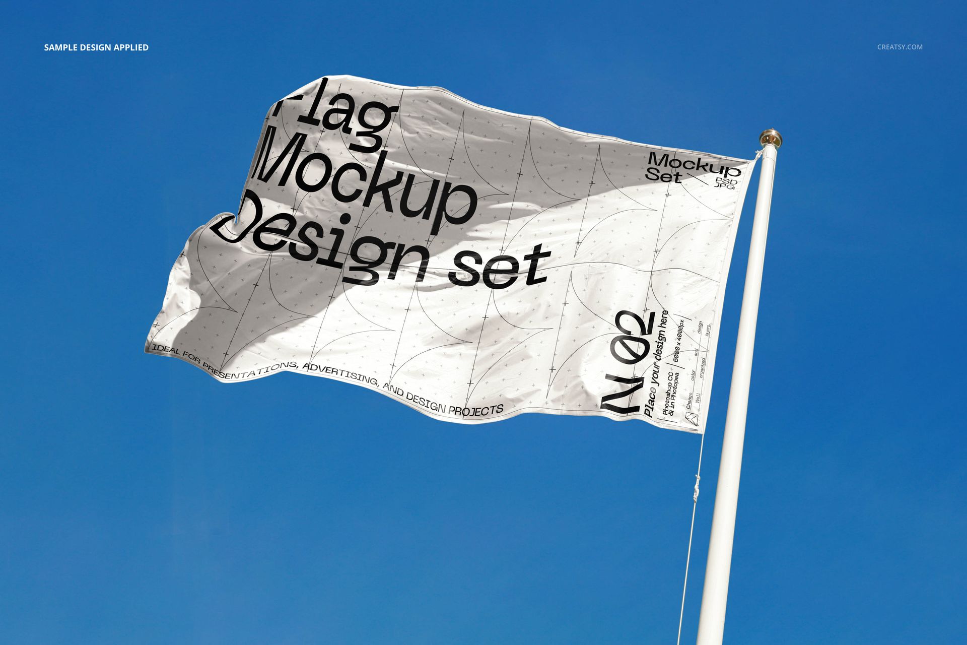 Flag mockup featuring a white fabric with bold black lettering and subtle grid lines, displayed outdoors on a pole.