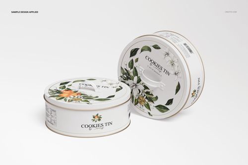 Two round cookie tin mockups featuring botanical designs and labeled sides, displayed on a clean white surface.
