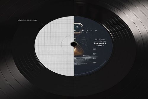 Black vinyl record mockup in close-up, displaying half a blank grid label and half a detailed music label design.
