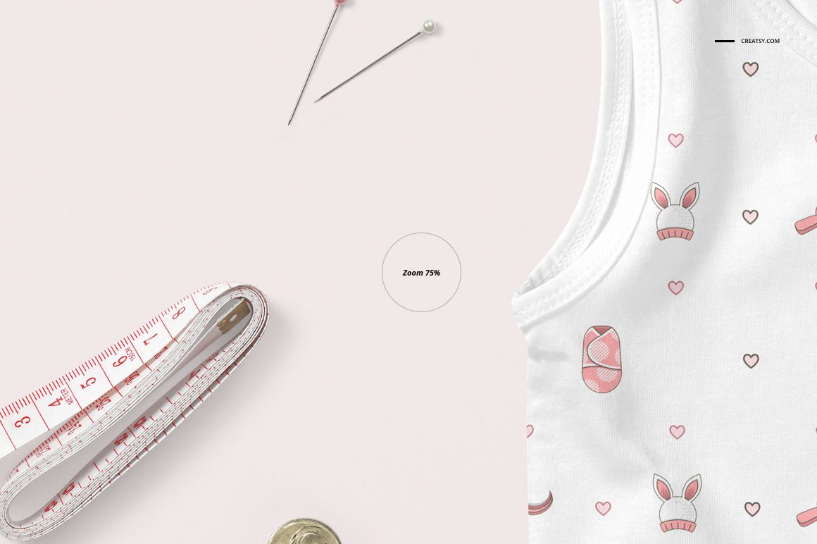 Front view of a baby tank top mockup with pink and white bunny and heart pattern, shown on a light background.