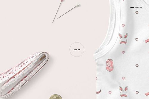 Front view of a baby tank top mockup with pink and white bunny and heart pattern, shown on a light background.