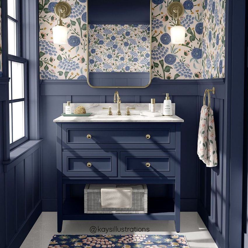 Bathroom mockup featuring a navy blue vanity with brass fixtures, floral wallpaper, and a matching rug in a well-lit space.