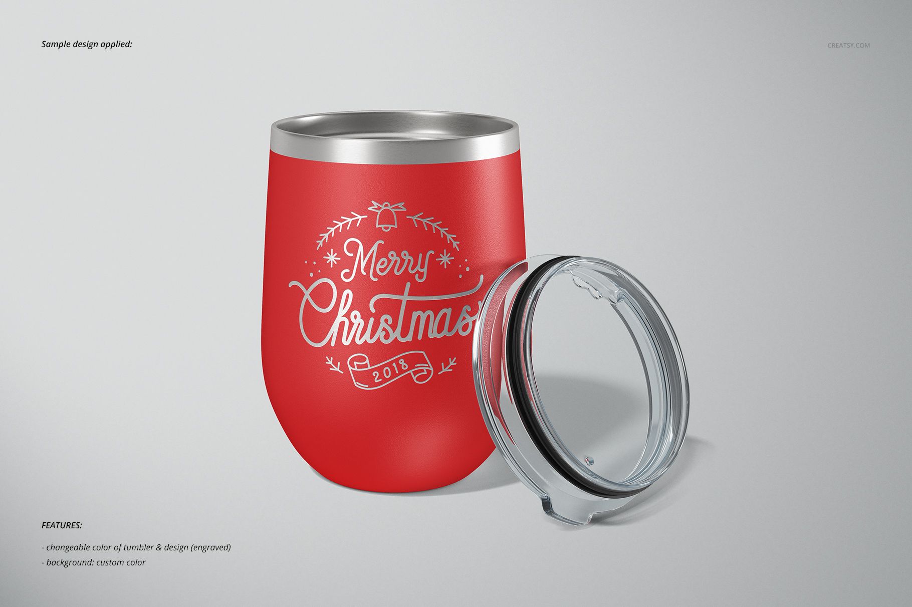 Red stemless wine cup with silver rim and clear lid, featuring white Christmas-themed text and decorative elements, front view.