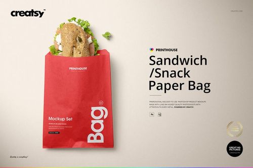 Front view of a red sandwich paper bag mockup with a baguette sandwich inside, displayed on a neutral background.