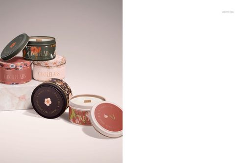 PSD mockup set of 4 oz. candle tins in different colors and patterns, arranged in a group with visible wooden wicks.
