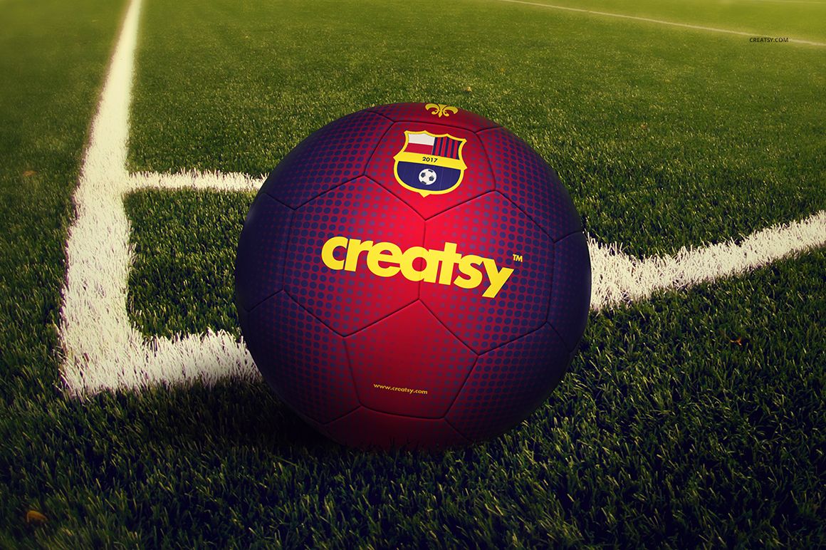 Front view of a soccer ball mockup featuring a dark purple and red design, placed on a sports field with white markings.
