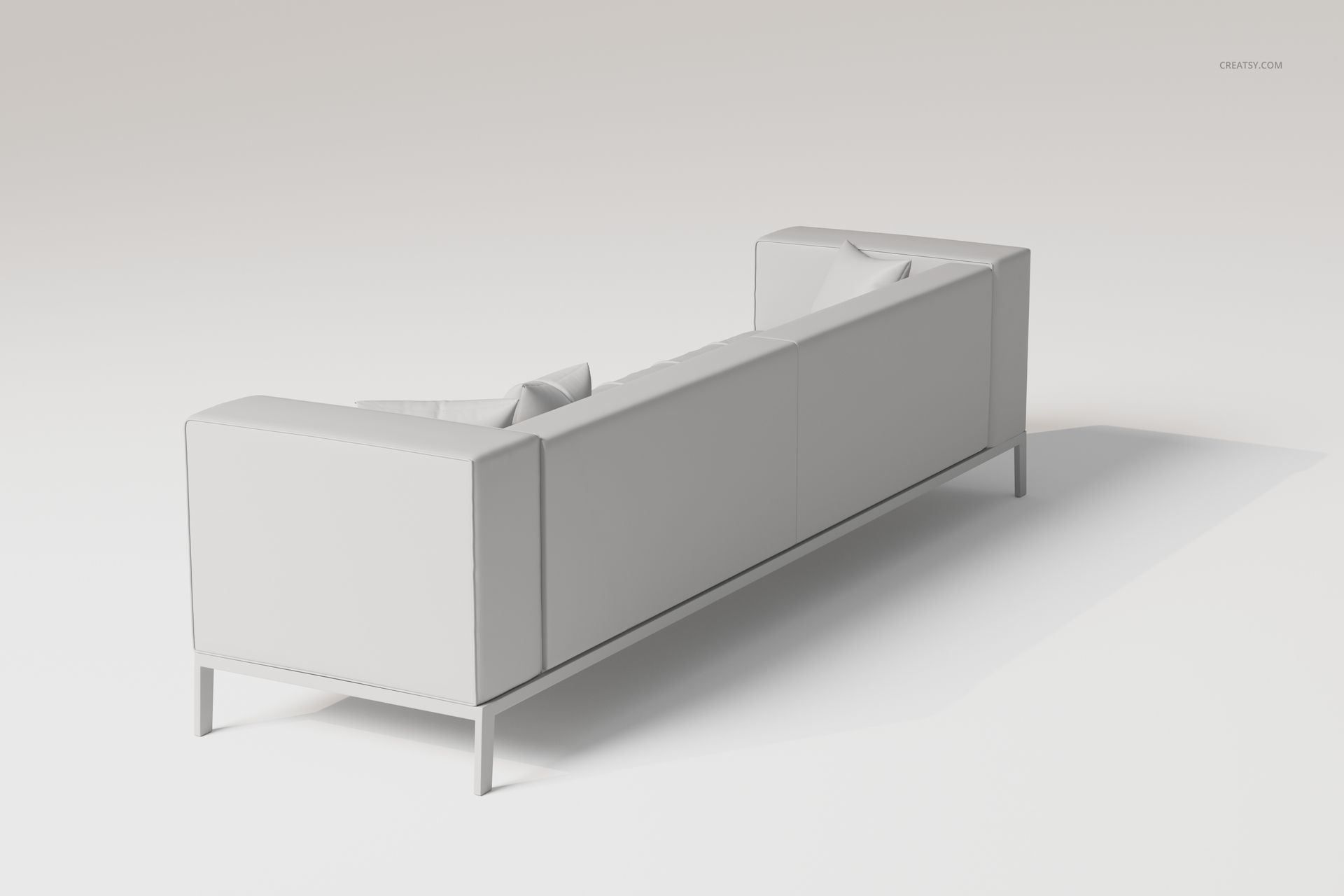 Extra long loft style sofa in light gray color, viewed from the back at an angle, set against a plain background.