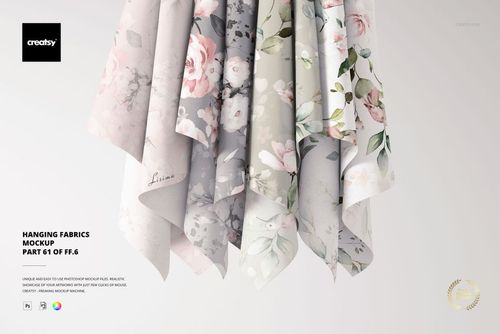 PSD mockup showing draped fabrics with delicate flower designs in muted pink, white, and gray tones, hanging vertically.