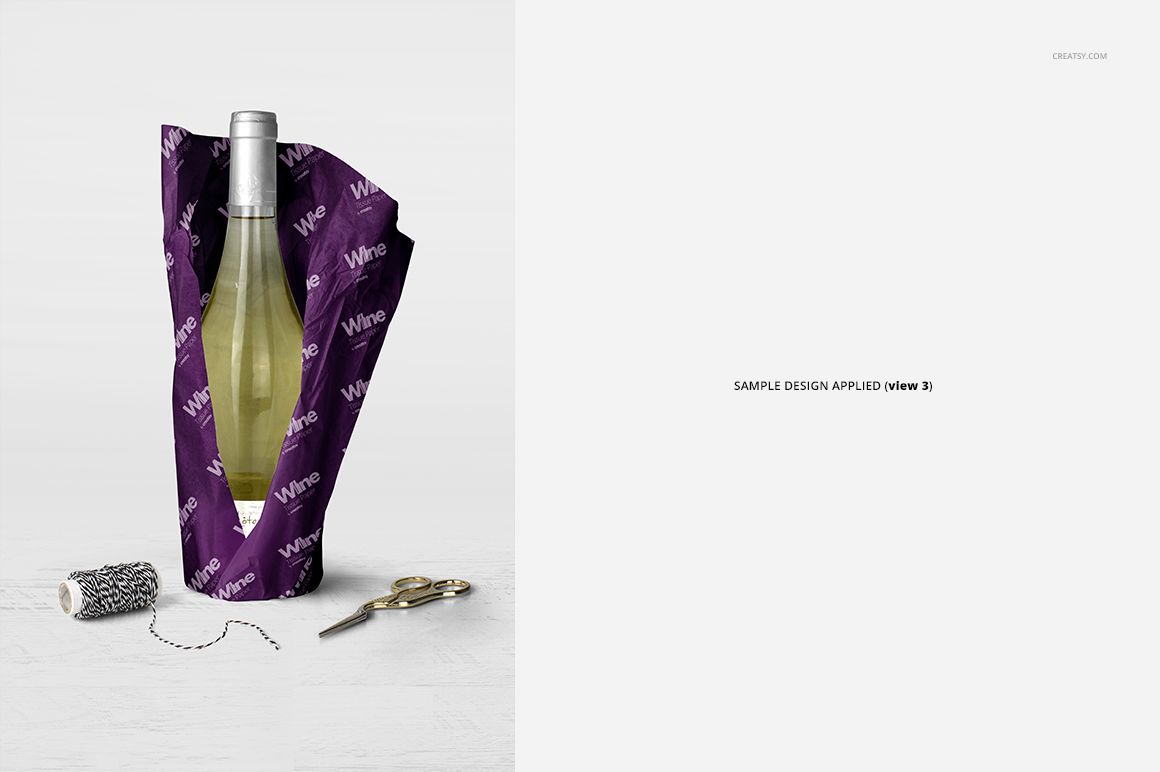 Wine wrapping tissue paper mockup featuring a bottle, purple paper with white print, and packaging tools on a clean background.