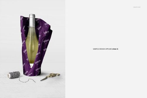 Wine wrapping tissue paper mockup featuring a bottle, purple paper with white print, and packaging tools on a clean background.
