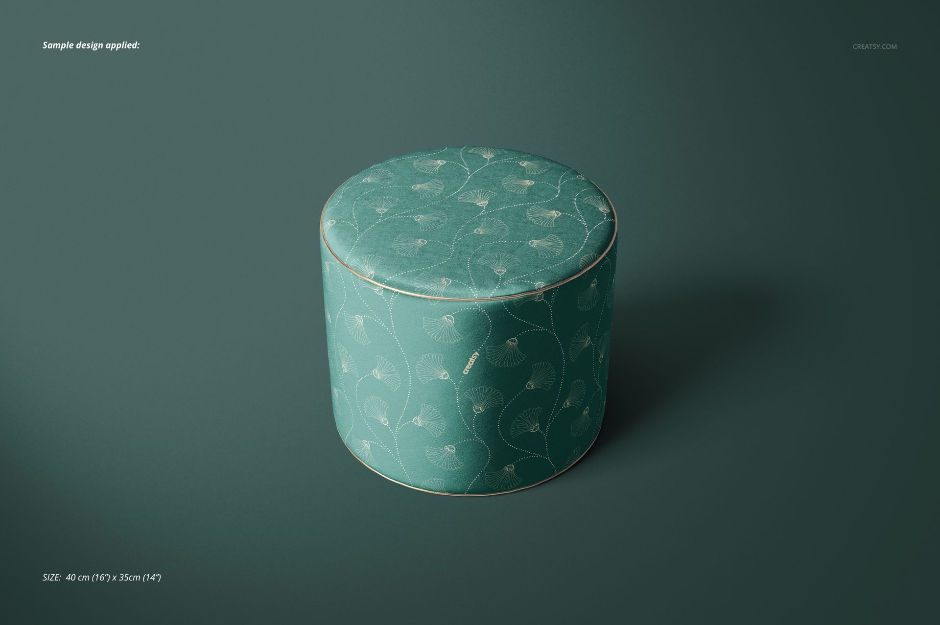 Teal velvet pouf mockup featuring a delicate leaf motif, displayed in a simple home setting with soft shadows.