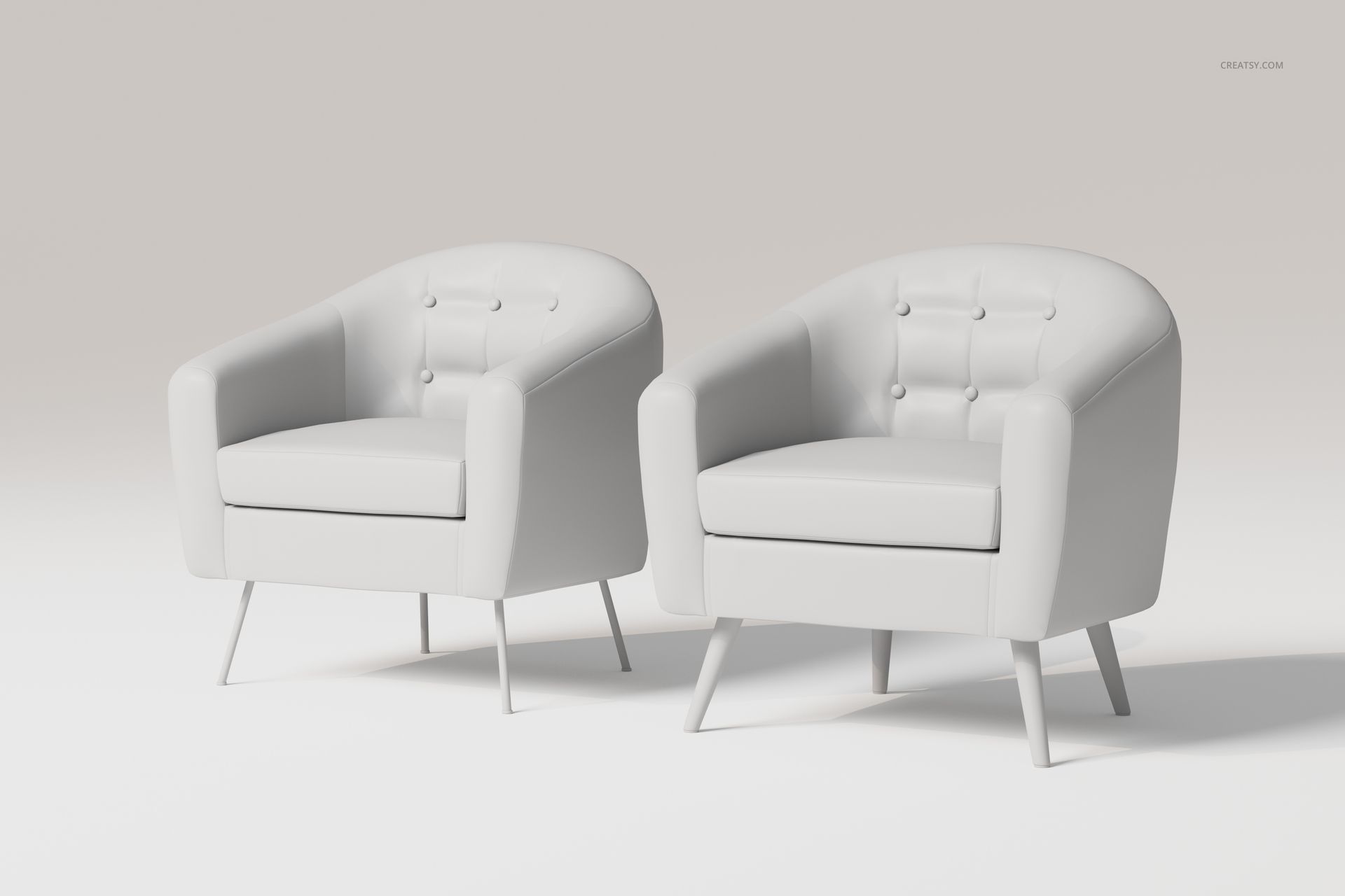 Front view of two button upholstered armchairs in light gray, featuring rounded backs and angled legs on a plain background.