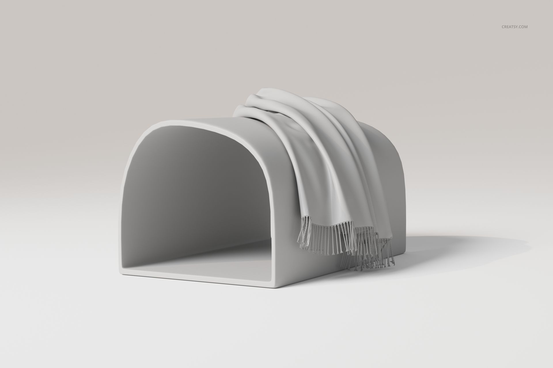 Draped throw blanket in light gray color displayed on a curved, minimalist stand against a neutral background.