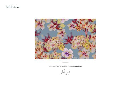 Rectangular mockup featuring a floral pattern with yellow and pink flowers on a blue background, viewed from above.