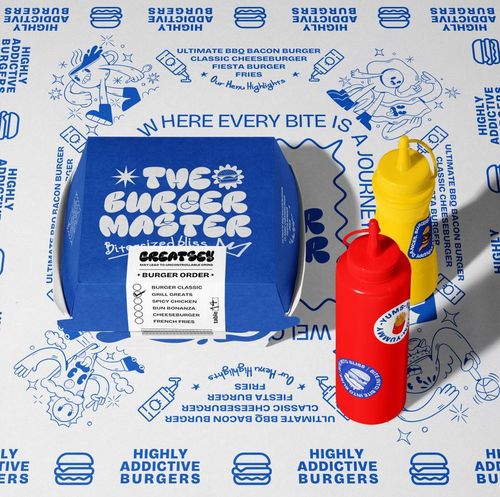 Blue burger packaging mockup displayed on graphic paper, accompanied by red ketchup and yellow mustard bottles.