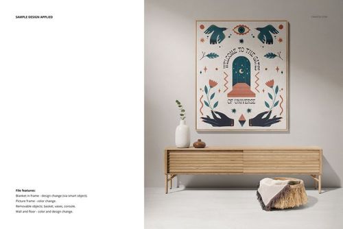 Mockup of a fringed woven throw blanket featuring a geometric design, displayed on a light wood bench beside a wall art piece.