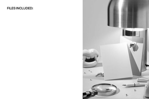 Halloween greeting card PSD mockup featuring two empty cards on a desk with themed props, lamp, and spooky decorations.