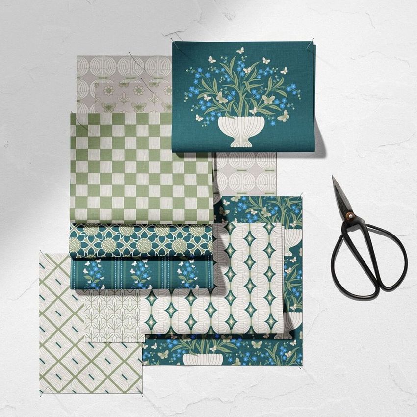 Fabric mockup featuring eight rectangular pieces with various botanical and geometric patterns in green, blue, and white tones.