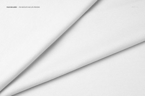 Close-up of overlapping white jersey fabrics in a PSD mockup, featuring subtle weave details and smooth folds.