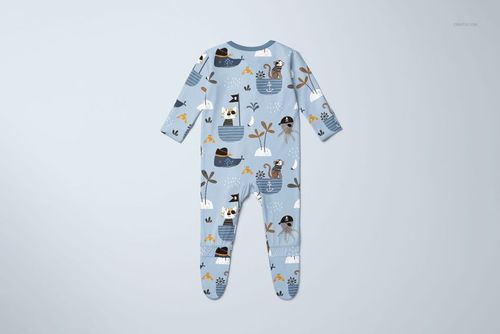 PSD mockup of a baby footie onesie with long sleeves, decorated with whimsical animal and boat motifs on a pale blue fabric.