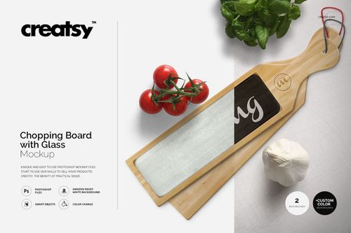 Top view of a wooden chopping board mockup with glass insert, placed on a light surface with tomatoes and garlic.
