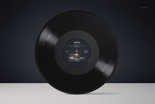 Front view of a black vinyl record mockup featuring a circular label design, displayed on a clean white tabletop.