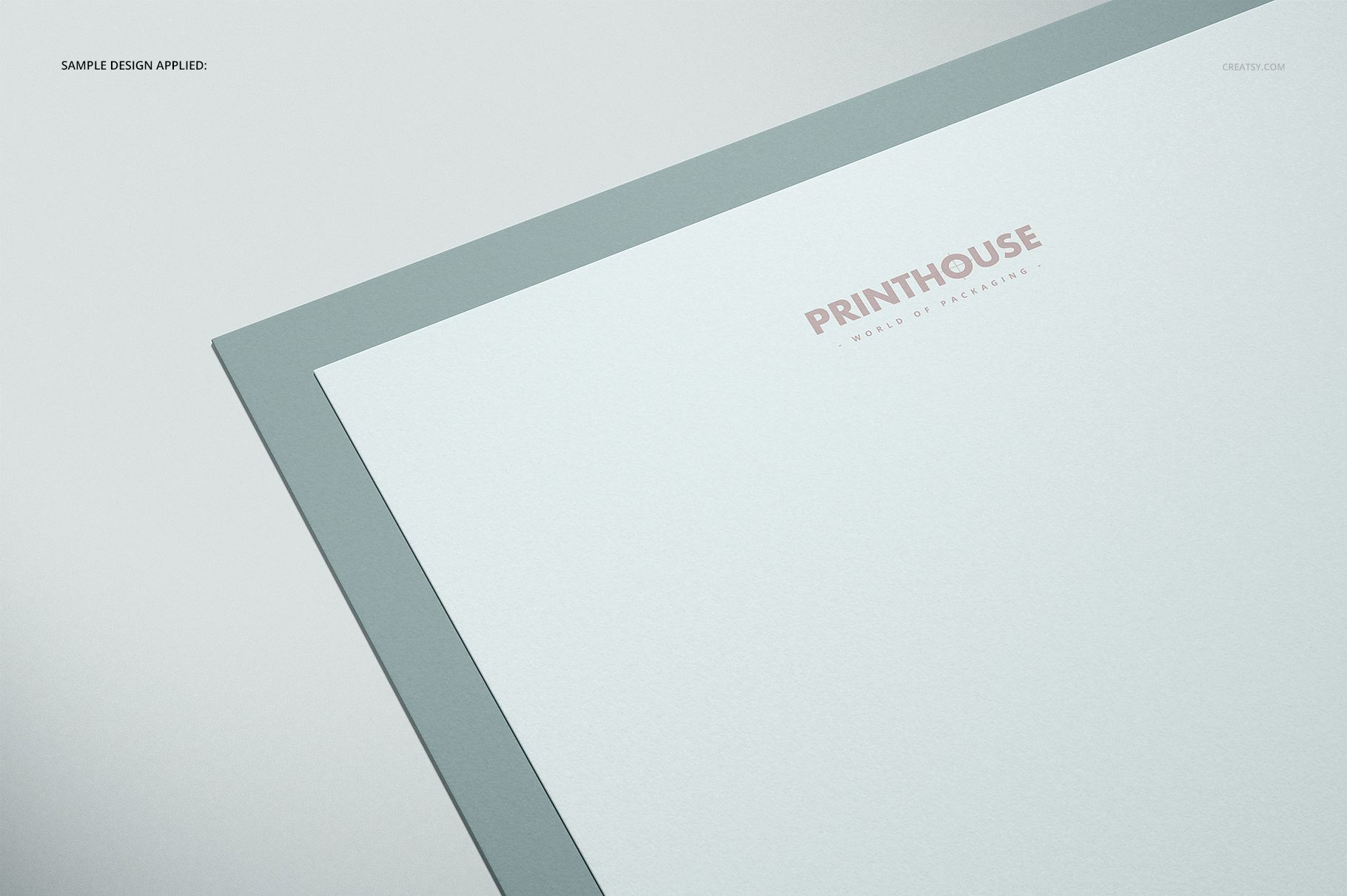 Flat card mockup with a gray border and white center, viewed from an angled top perspective on a light background.