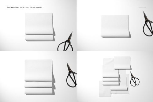 Set of white fabric pieces displayed on a flat surface, shown from a top view with black scissors nearby.