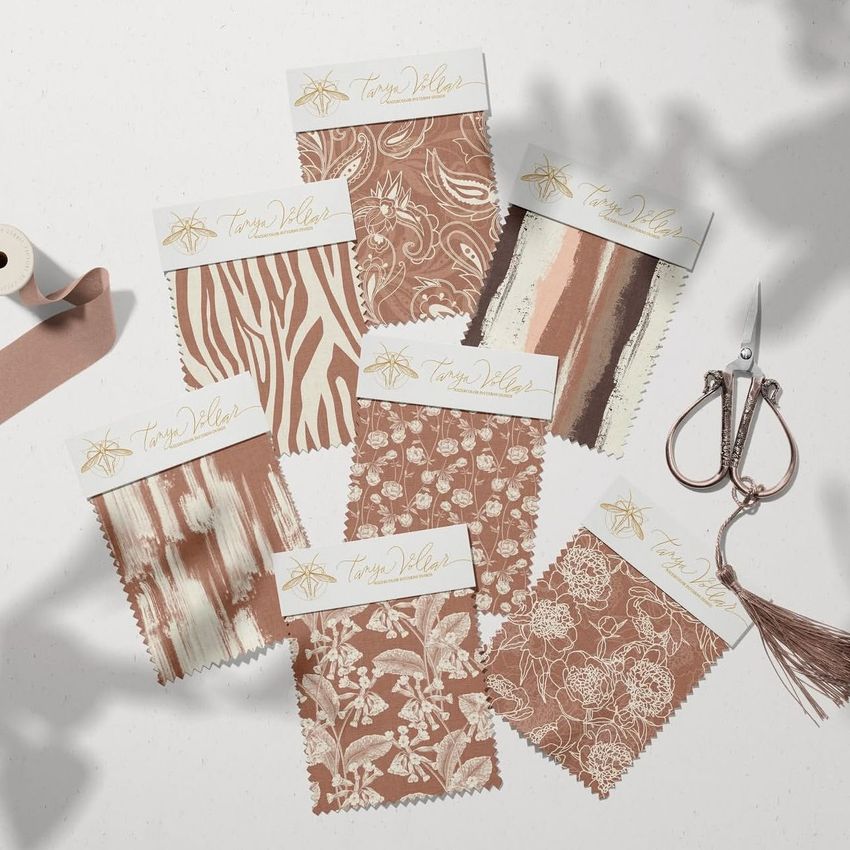 Fabric swatches mockup showing six rectangular samples in brown and beige tones with various patterns on a light surface.