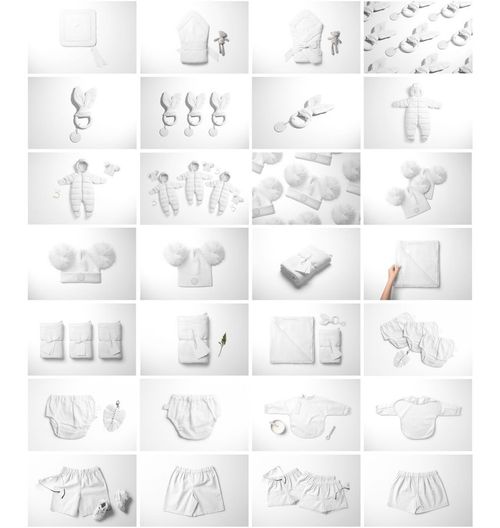 Assorted kids and baby clothing and accessories mockup set displayed on a white background in top view layout.
