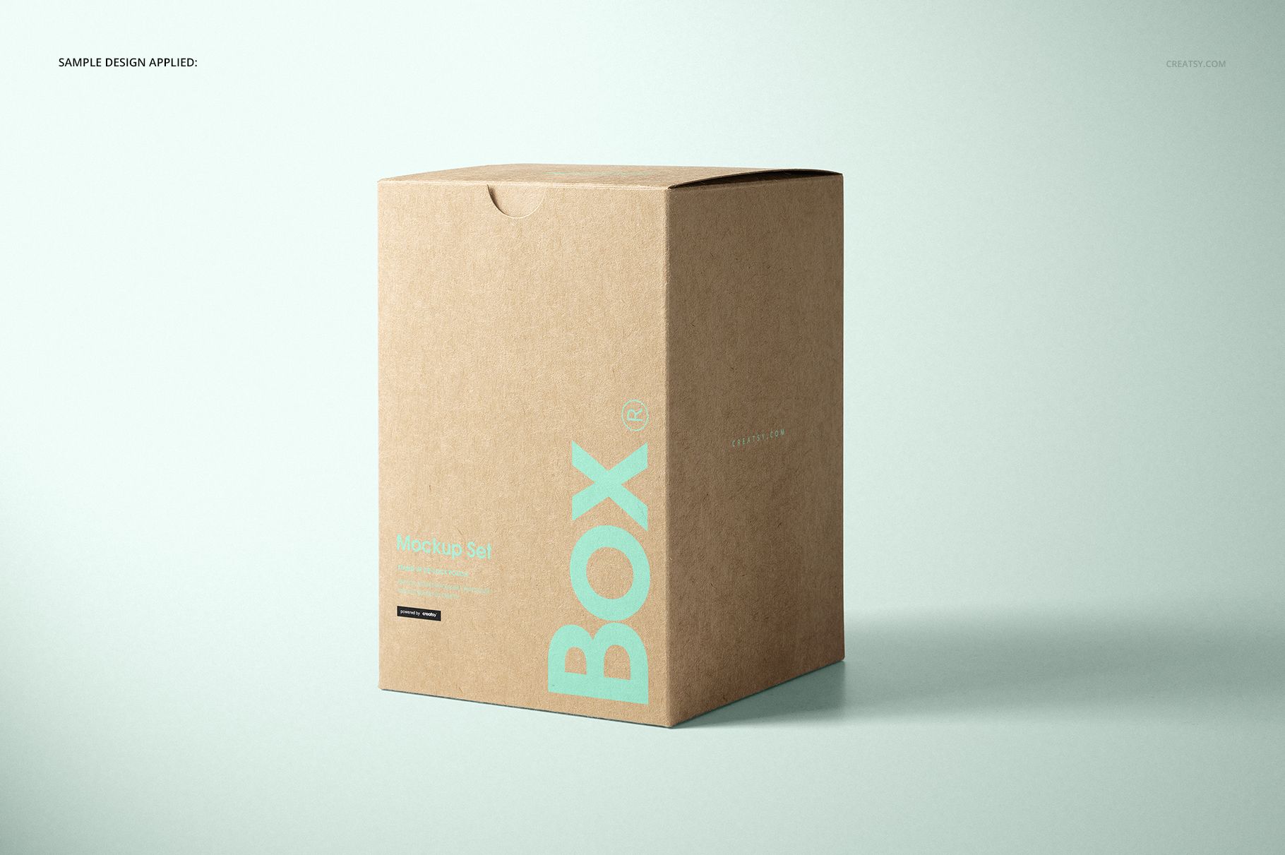 Kraft tuck top gift box mockup featuring a square box with minimal blue lettering on a soft neutral backdrop.