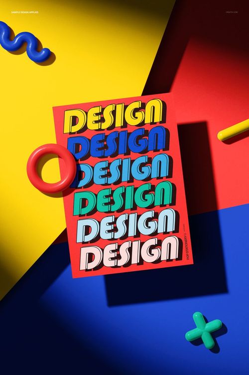 Colorful abstract poster card mockup with bold 'DESIGN' text, placed on geometric yellow, blue, and red background.
