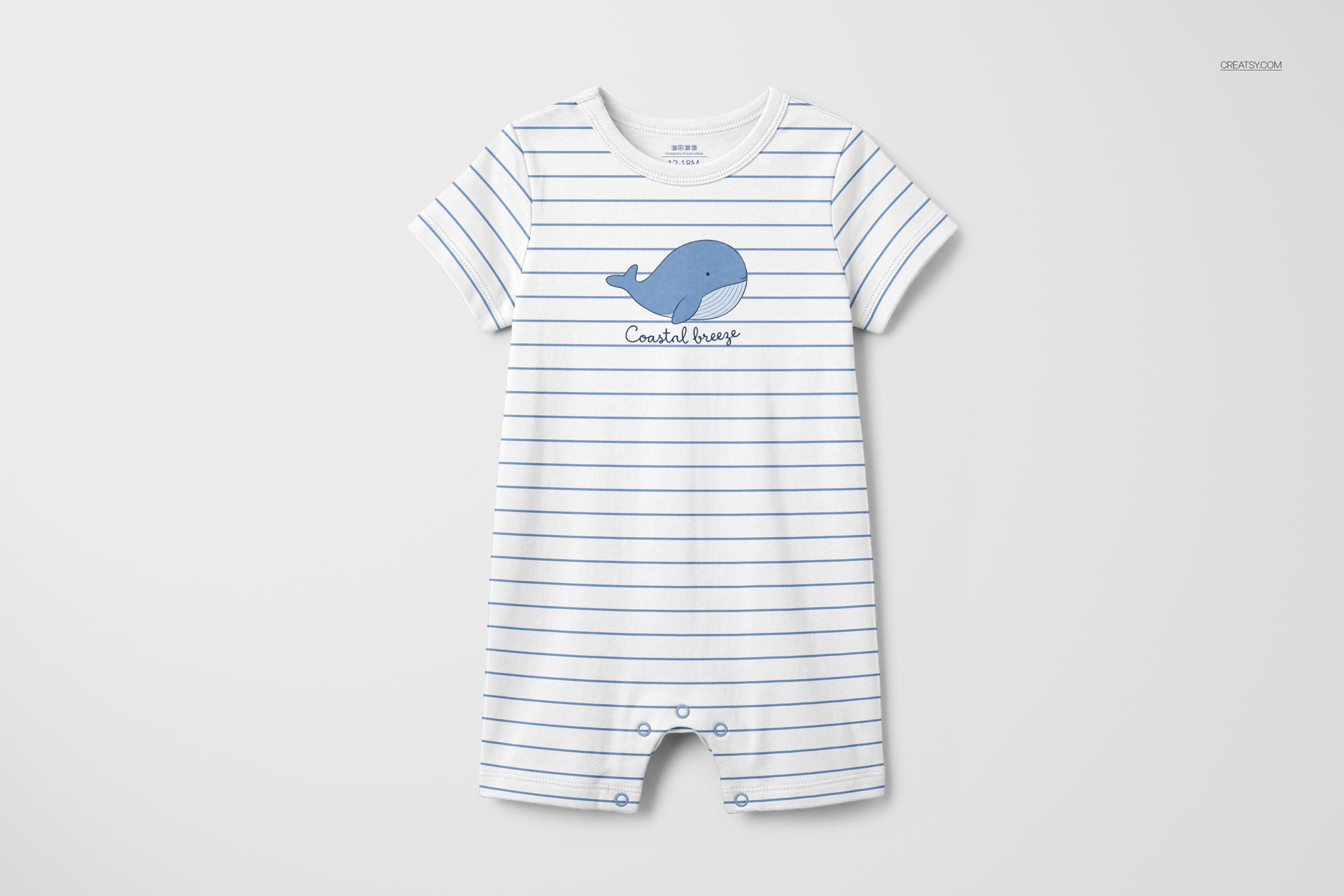 Front view of a striped baby romper suit mockup featuring a blue whale graphic and snap buttons at the bottom.