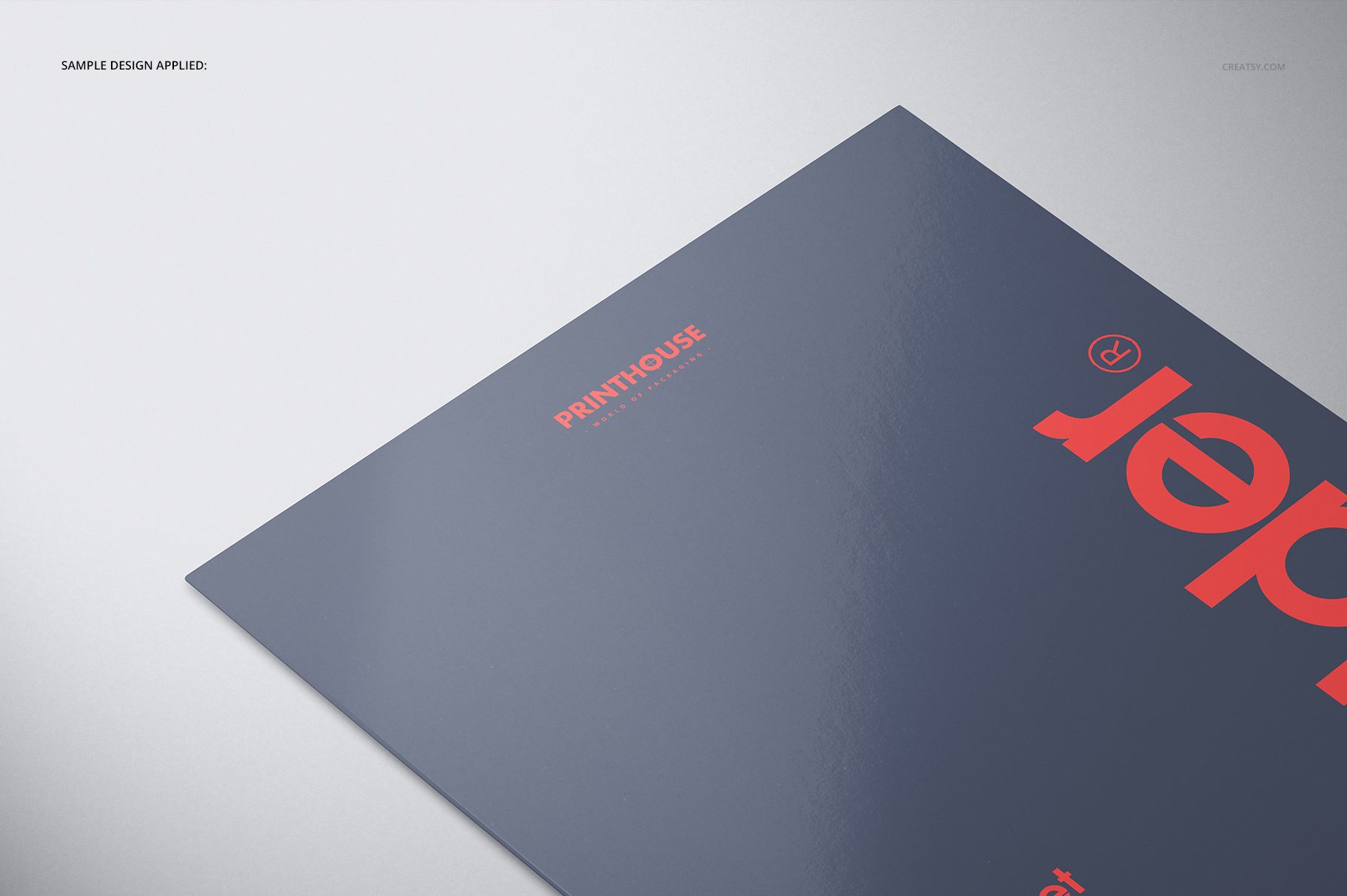 Front view of a two-pocket folder mockup with a dark blue cover and bold red text, placed on a light surface.