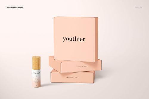 Front and side view of peach mailing boxes and a 30 ml bottle, arranged on a neutral surface for PSD mockup use.