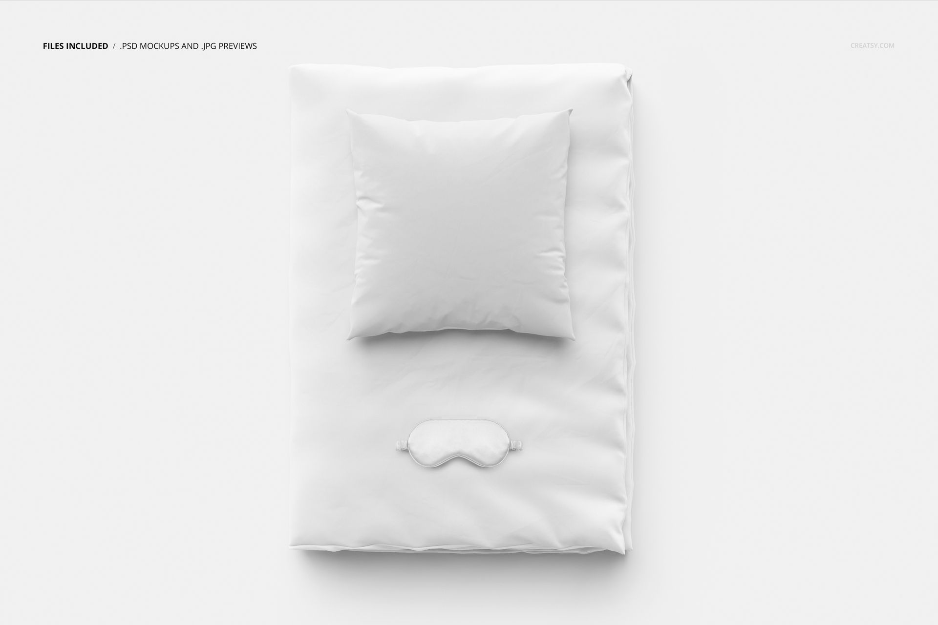 Minimalist PSD mockup showing a white duvet, pillow, and sleep mask laid out neatly against a neutral background.
