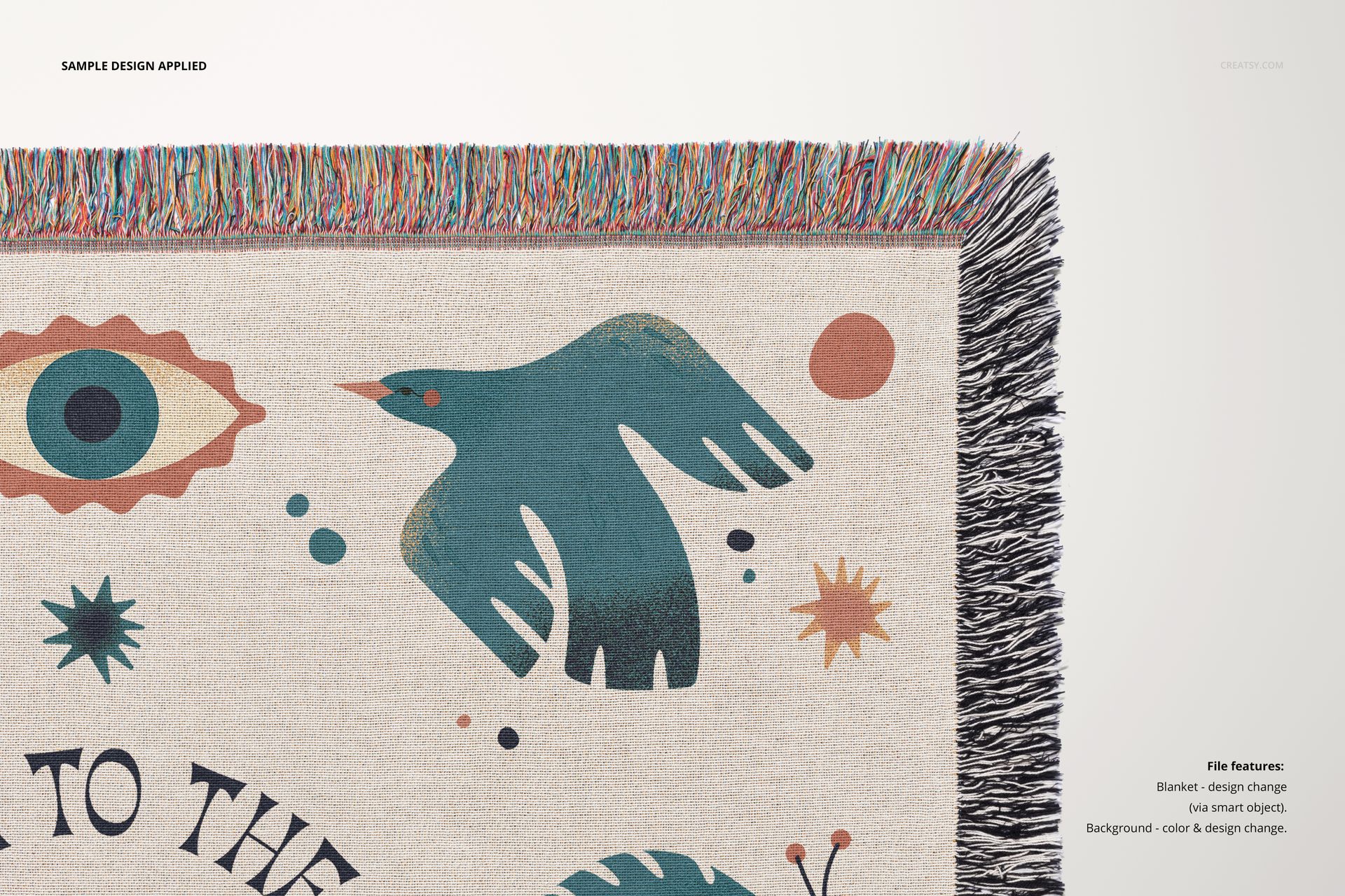 Jacquard fringed throw blanket mockup showing detailed weave, multicolor fringe, and abstract design elements.