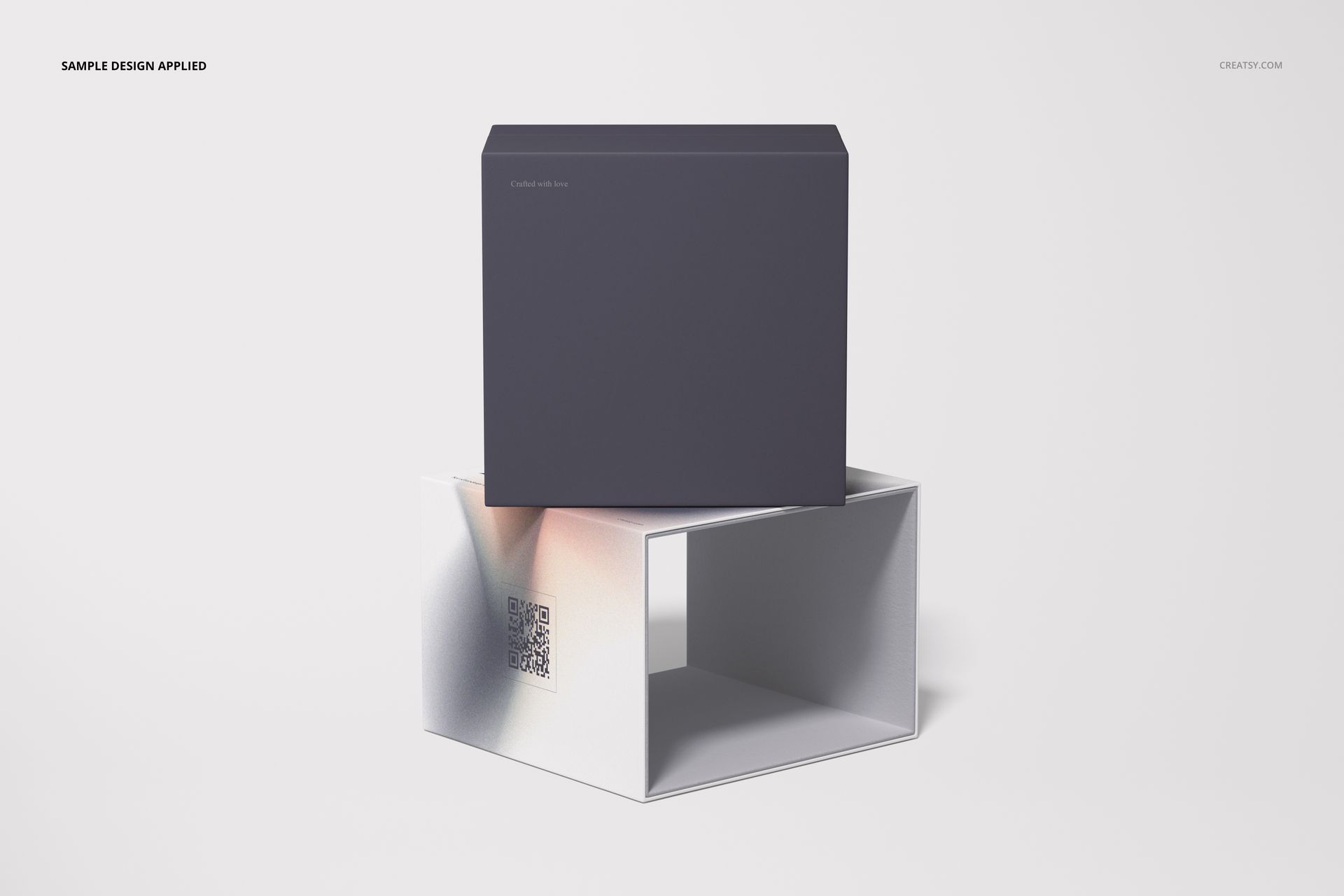 Front view of a slide gift box mockup set with a dark rectangular box on top of a white open box, against a plain background.