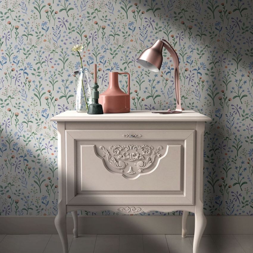 Interior scene mockup showing a vintage white nightstand with ornate details, set against a floral patterned wallpaper.