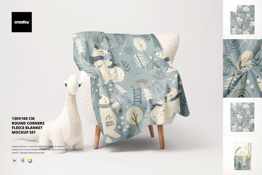 Fleece blanket with rounded corners draped over a sherpa chair, featuring playful animal and tree patterns in muted blue tones.