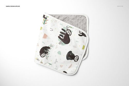 Minky burp cloth mockup featuring a white cloth with playful sloth illustrations, shown from a top view on a light background.