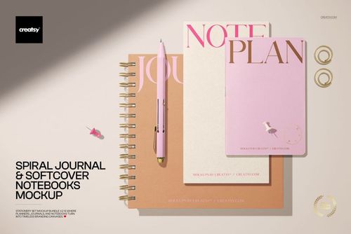 Stationery mockup featuring a spiral-bound journal and softcover notebooks in pink and cream, arranged from above.