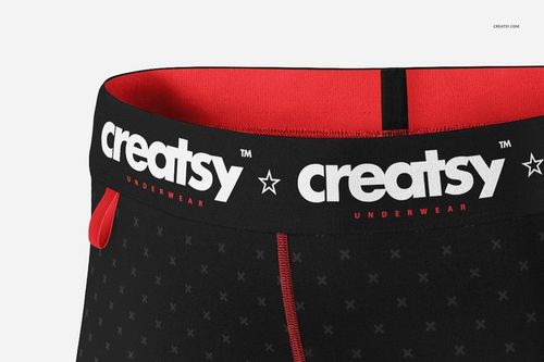 Detailed mockup of adult compression shorts featuring a black base, red accents, and visible branded waistband in front view.