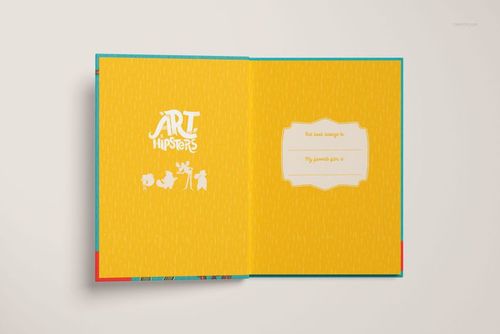 Hardcover book mockup displayed open, revealing yellow illustrated endpapers and a decorative label on the right.