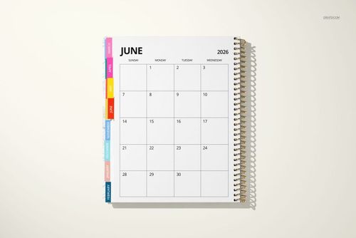 Top view of a tabbed weekly and monthly planner mockup showing a clean calendar layout and spiral binding.