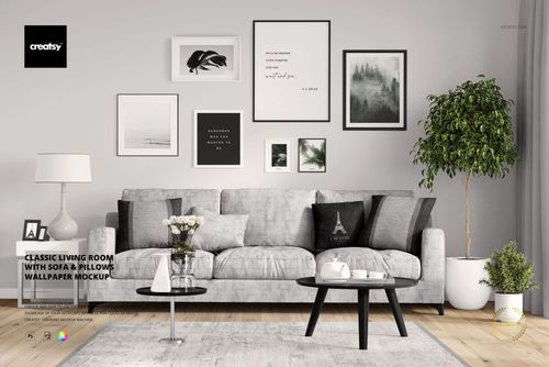 PSD mockup of a stylish living room showing a gray sofa, assorted pillows, minimalist wall decor, and greenery.